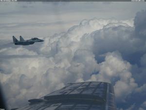 MiG-29 fotený z Tu-154
