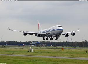Air China Cargo (B-2460) landing at 18R